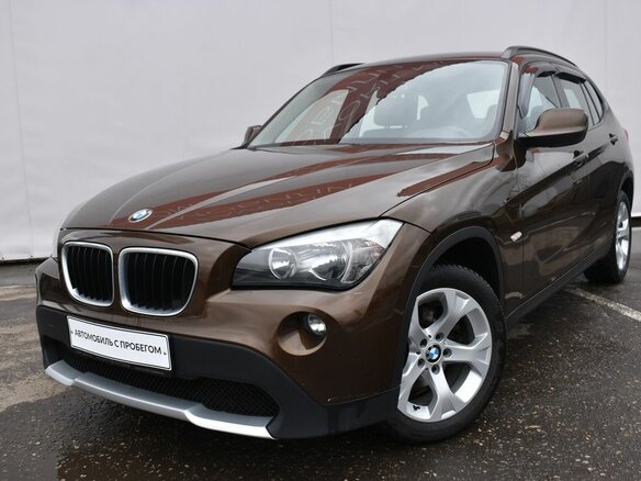 2011 BMW X1 18i I (E84), коричневый