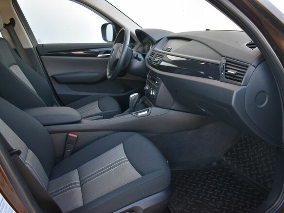 2011 BMW X1 18i I (E84), коричневый - вид 12