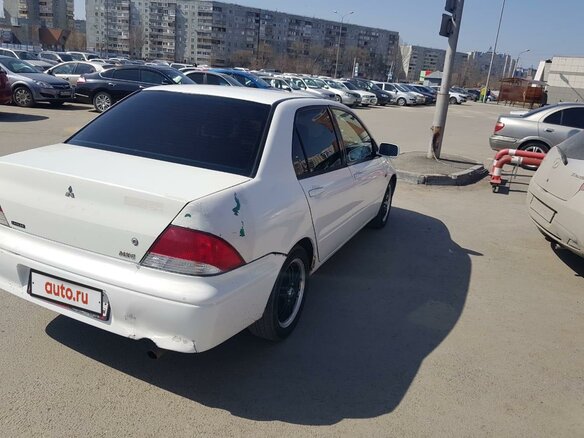 2000 Mitsubishi Lancer, белый - вид 3