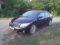 2008 Toyota Corolla X (E140, E150), чёрный, 780000 рублей - вид 2