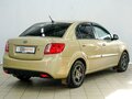 2009 Kia Rio II Рестайлинг, бежевый - вид 2