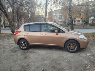2009 Nissan Tiida I, золотистый, 700000 рублей, вид 2