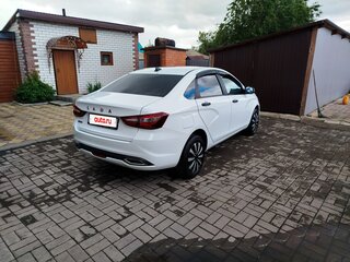 2024 Lada (ВАЗ) Vesta I Рестайлинг (NG), белый, 1310000 рублей, вид 4