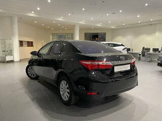 2013 Toyota Corolla XI (E160, E170, E180), чёрный, 930000 рублей, вид 4