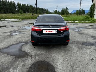 2014 Toyota Corolla XI (E160, E170, E180), чёрный, 1300000 рублей, вид 5