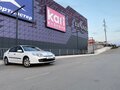 2008 Renault Laguna III, белый - вид 1
