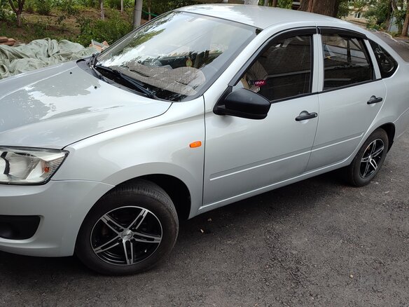 2014 Lada (ВАЗ) Granta I, серебристый, 650000 рублей - вид 6