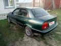 1998 Suzuki Baleno I, зелёный, 130000 рублей - вид 2