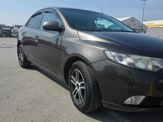 2011 Kia Cerato 6-speed II, коричневый, 610000 рублей, вид 4