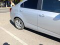2014 Chevrolet Aveo II, серебристый, 600000 рублей - вид 5