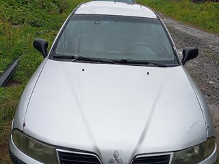 2001 Mitsubishi Carisma I Рестайлинг, серебристый, 130000 рублей, вид 2