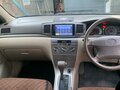 2004 Toyota Corolla Fielder IX (E120, E130), белый, 750000 рублей - вид 2