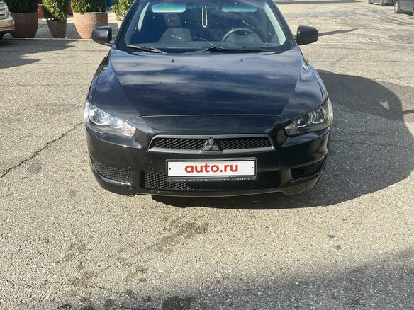 2008 Mitsubishi Lancer X, чёрный, 620000 рублей - вид 1
