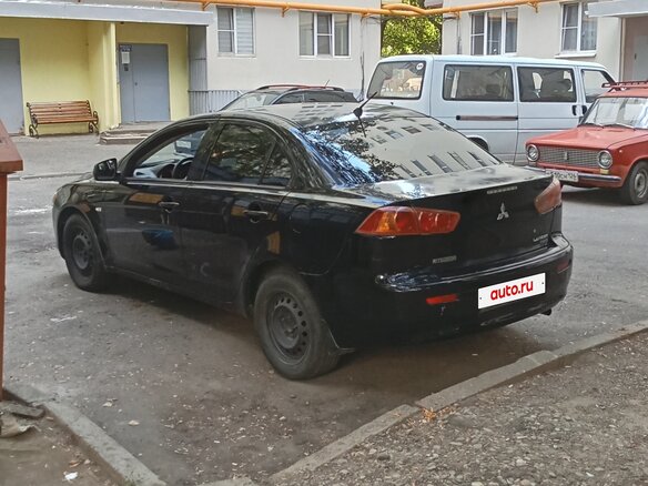 2008 Mitsubishi Lancer X, чёрный, 440000 рублей - вид 2