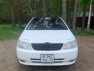 2003 Toyota Corolla IX (E120, E130), белый, 610000 рублей, вид 2