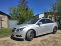 2010 Chevrolet Cruze I, серебристый, 666000 рублей - вид 1