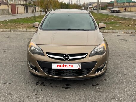 2012 Opel Astra J Рестайлинг, коричневый, 540000 рублей, вид 3