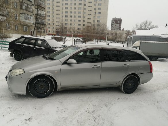 2001 Nissan Primera III (P12), серебристый - вид 2