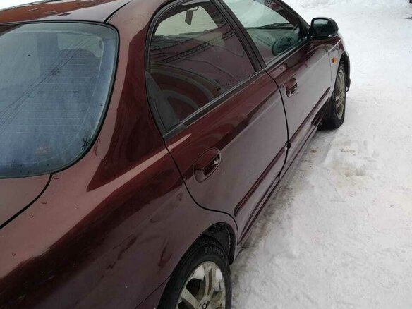 2006 Kia Spectra I Рестайлинг 2, пурпурный - вид 3