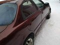 2006 Kia Spectra I Рестайлинг 2, пурпурный - вид 3
