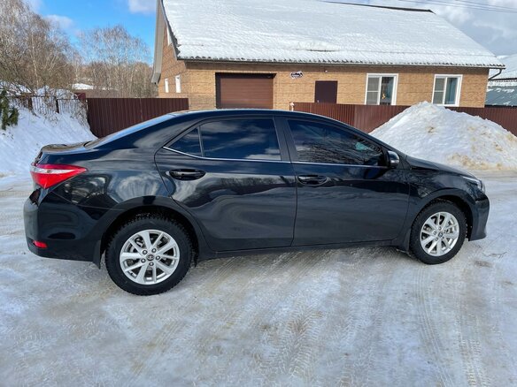2013 Toyota Corolla XI (E160, E170, E180), чёрный - вид 4