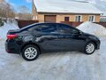 2013 Toyota Corolla XI (E160, E170, E180), чёрный - вид 4