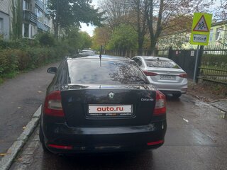 2011 Skoda Octavia II (A5) Рестайлинг, чёрный, 550000 рублей, вид 2