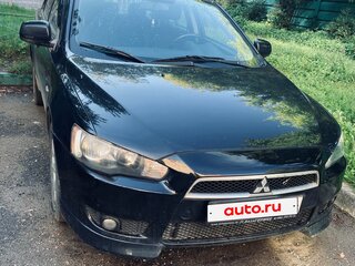 2010 Mitsubishi Lancer X, чёрный, 800000 рублей, вид 1