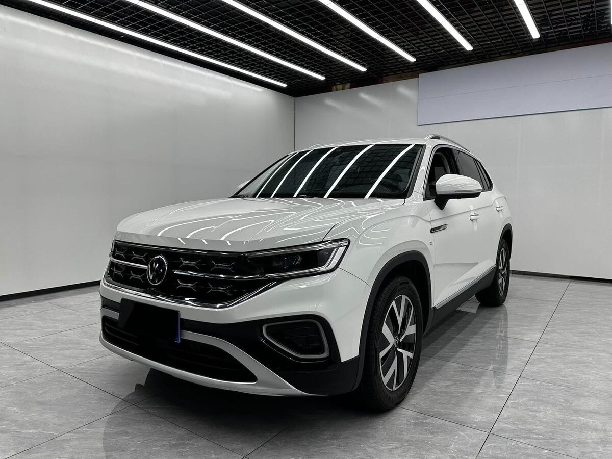 Открыть фотографии: Volkswagen Tayron I Рестайлинг
