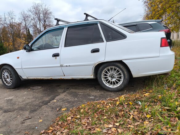 2009 Daewoo Nexia I Рестайлинг, белый, 180000 рублей - вид 3
