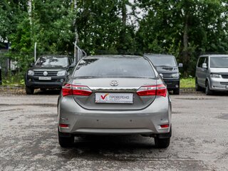 2014 Toyota Corolla XI (E160, E170, E180), бежевый, 1220000 рублей, вид 4