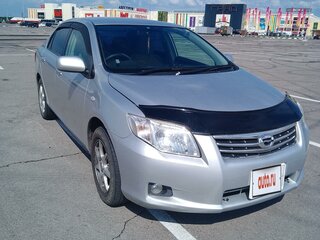 2010 Toyota Corolla Axio X (E140, E150) Рестайлинг, серебристый, 990000 рублей, вид 2
