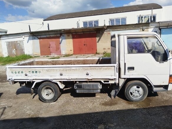 1990 Mitsubishi Minicab, белый - вид 6