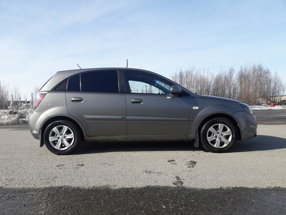 2011 Kia Rio II Рестайлинг, серый - вид 1