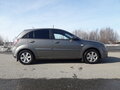 2011 Kia Rio II Рестайлинг, серый - вид 1