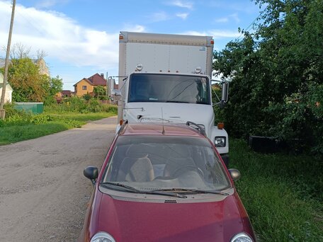 2003 Freightliner Business Class (FL), белый, 900000 рублей, вид 4