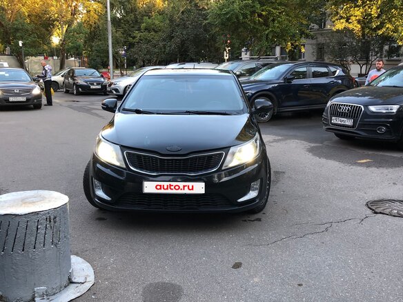 2011 Kia Rio 4-speed III, чёрный, 650000 рублей - вид 1