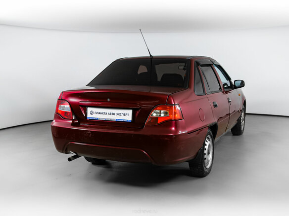 2009 Daewoo Nexia I Рестайлинг, красный - вид 1