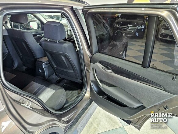 2012 BMW X1 20d I (E84), коричневый - вид 17