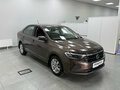 2021 Volkswagen Polo VI, коричневый - вид 2