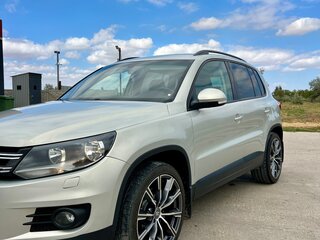 2014 Volkswagen Tiguan I Рестайлинг, серебристый, 1600000 рублей, вид 1