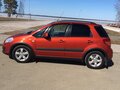 2011 Suzuki SX4 I (Classic) Рестайлинг, оранжевый - вид 4