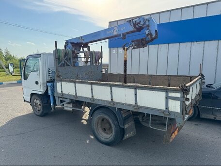 1990 Isuzu Elf (N-series), белый, 2450000 рублей, вид 4