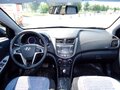 2016 Hyundai Solaris I Рестайлинг, коричневый, 945000 рублей - вид 11