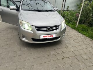2009 Toyota Corolla Axio X (E140, E150) Рестайлинг, серебристый, 750000 рублей, вид 2