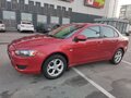 2008 Mitsubishi Lancer X, красный - вид 1