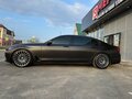 2016 BMW 7 серии 750i xDrive VI (G11/G12), коричневый, 5200000 рублей - вид 8