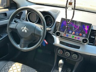 2010 Mitsubishi Lancer X, чёрный, 775000 рублей, вид 3