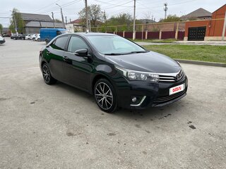 2014 Toyota Corolla XI (E160, E170, E180), чёрный, 1450000 рублей, вид 4