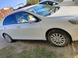 2006 Toyota Corolla Axio X (E140, E150), белый, 750000 рублей, вид 4
